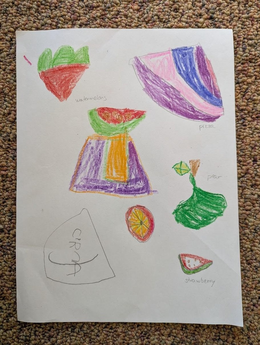 A child's drawing showing colored fraction slices of various fruits including strawberry, lemon, orange, watermelon, and pear
